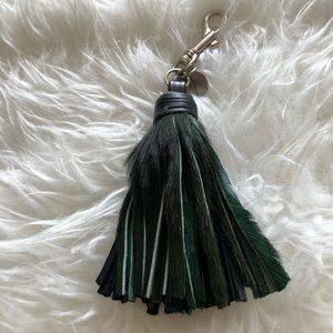 Tassel made of leather and feathers